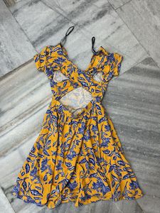 Forever 21. Floral Yellow Back Criss Cross  Dress