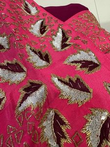 Pink and Maroon Embellished Saree