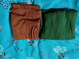 Red A-line kurti with green palazo pant Set.