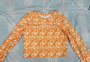 Orange Swirl Long Sleeve Crop Top