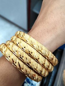 gold plated bangles (4pcs)