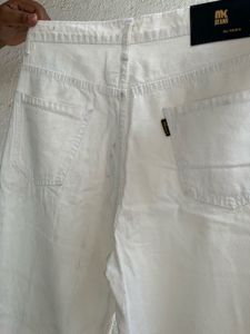 : Ivory Flow Wide-Leg Jeans