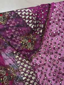 Heavy Purple Stone And Sequin Work Net Saree