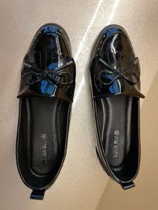 new bright shiny black westside loafers