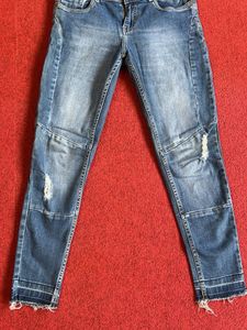 Distressed Denim Jeans