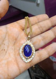 Gold Tone Blue Stone Pendant