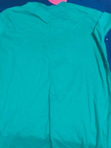 A Green Colour Tshirt For Women