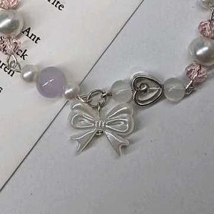 Cute Beaded Bracelet with Bow Charm