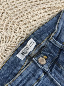 Ripped Knee Denim Jeans