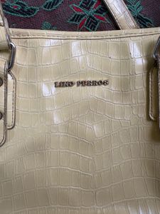 Lino Perros Cream Yellow Textured Handbag