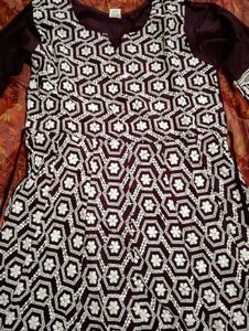 purple and white colour embroidery kurthi