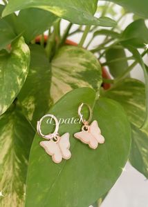 White Butterfly Earrings.