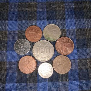 8 Coins Of Different Foreign Countries