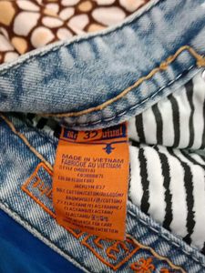 Ripped Light Wash Denim Jeans