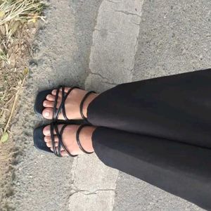 Sleek And Simple Flat Black Sandal