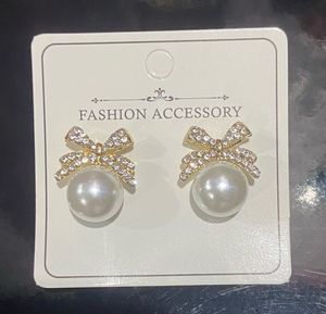 Sparkling Bow and Faux Pearl Gold Plated Studs