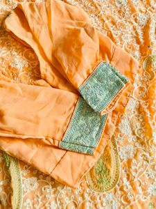 heavy peach embroidered saree