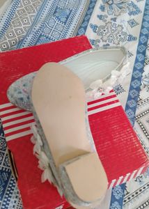 White Cinderela Shoes.
