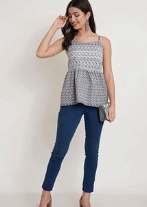 Embroidered Peplum Top