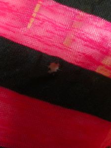Shrug .. Like New.. It Just Has A Small Barely Visible Hole..