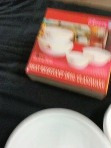 Brand new four piece Stackable  bowl