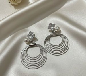Silver Circle Dangle Earrings