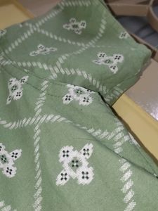 A Green Frock Type Top With Size XXL