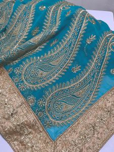 Heavy embroidery sea green saree