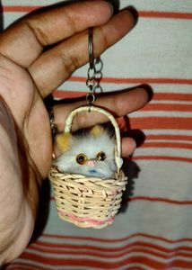 &#34;Fluffy Cat Keyring in Woven Basket&#34;