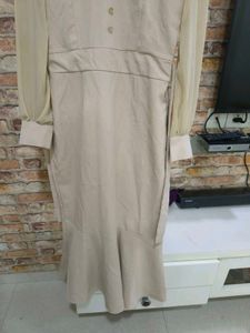 Elegant Beige Midi Dress with Ruffle Hem