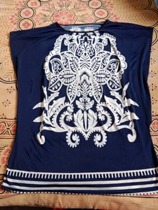 There are 3 Sarees And 2 Plus Size Tops
