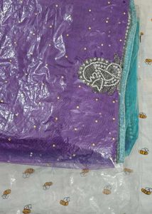 Purple Net Saree With Blouse And Petticoat