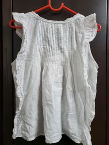 Ruffled Sleeveless White Top