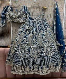 Blue Embellished Lehenga Choli With Dupatta