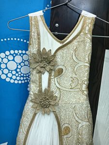 Beautiful white dress with golden flower work