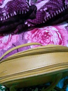 Tan Handbag with Butterfly Charm