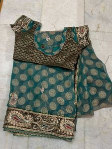 Elegant Teal &amp; Gold Saree