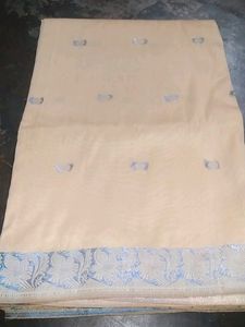 Elegant Cream Saree with Silver Border