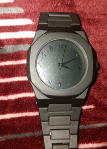 matt black watch with Arabic dial