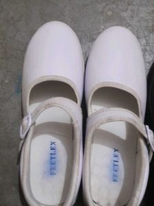 black and white school shoes