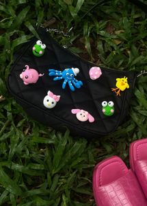 clay keychains, fridge magnets and bagpins