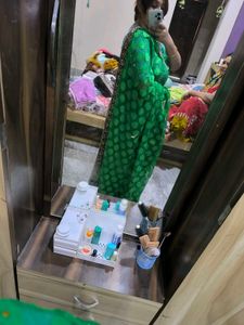 Green Leaf Saree With Yellow Stones.