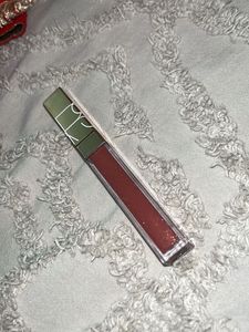 Nars lip gloss in the shade unbroken