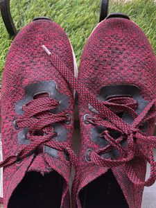 maroon sneakers