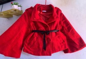 Red belted coat