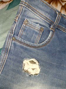 Distressed Denim Jeans