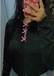 A Black Crop Top With Cute Pink Bow