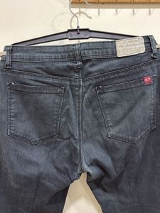 Slight slim fit greenish black jean