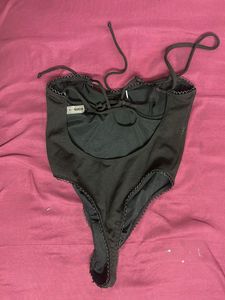 Backless. Bodysuit
