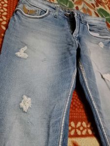 Distressed Denim Jeans